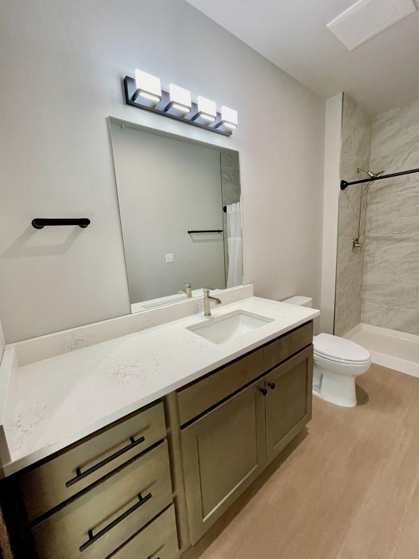 Bathroom vanity and shower, cleaned