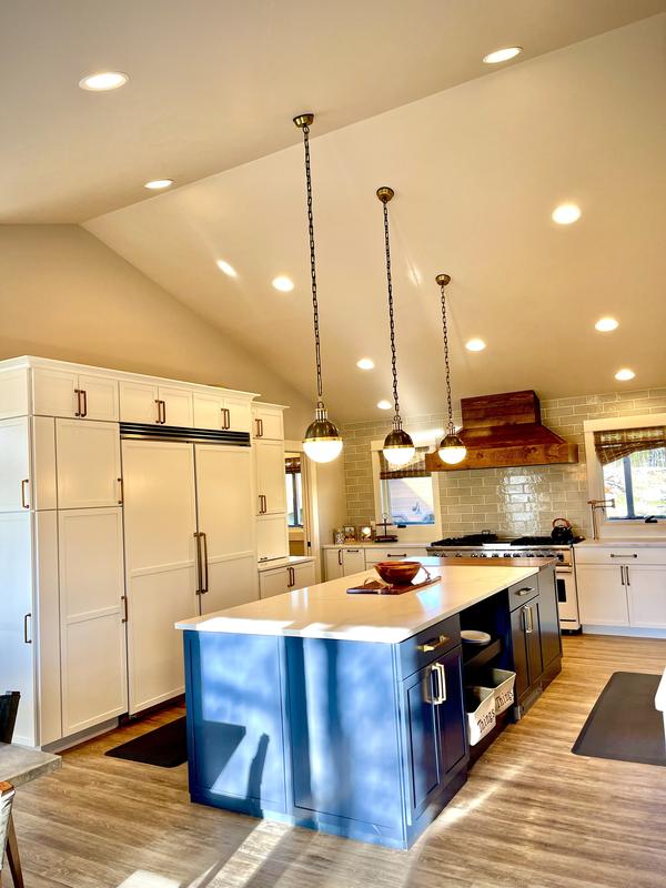 Kitchen island beneath pendant lighting